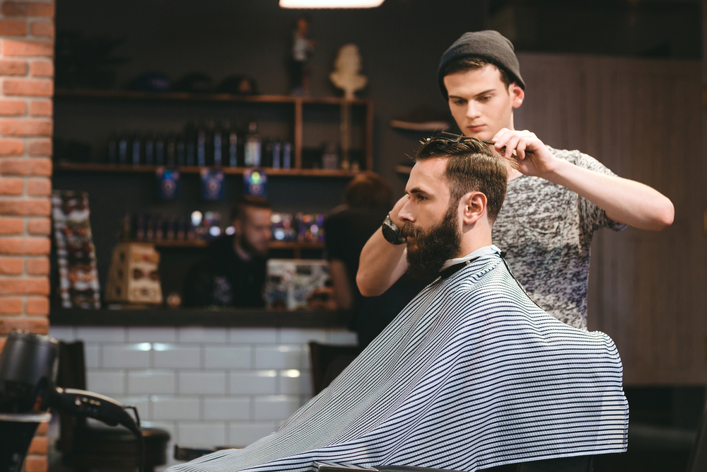 barber cutting hair